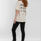 Vintage weißes Oversized Damen T-Shirt mit grafischem Backprint von La Label Beige